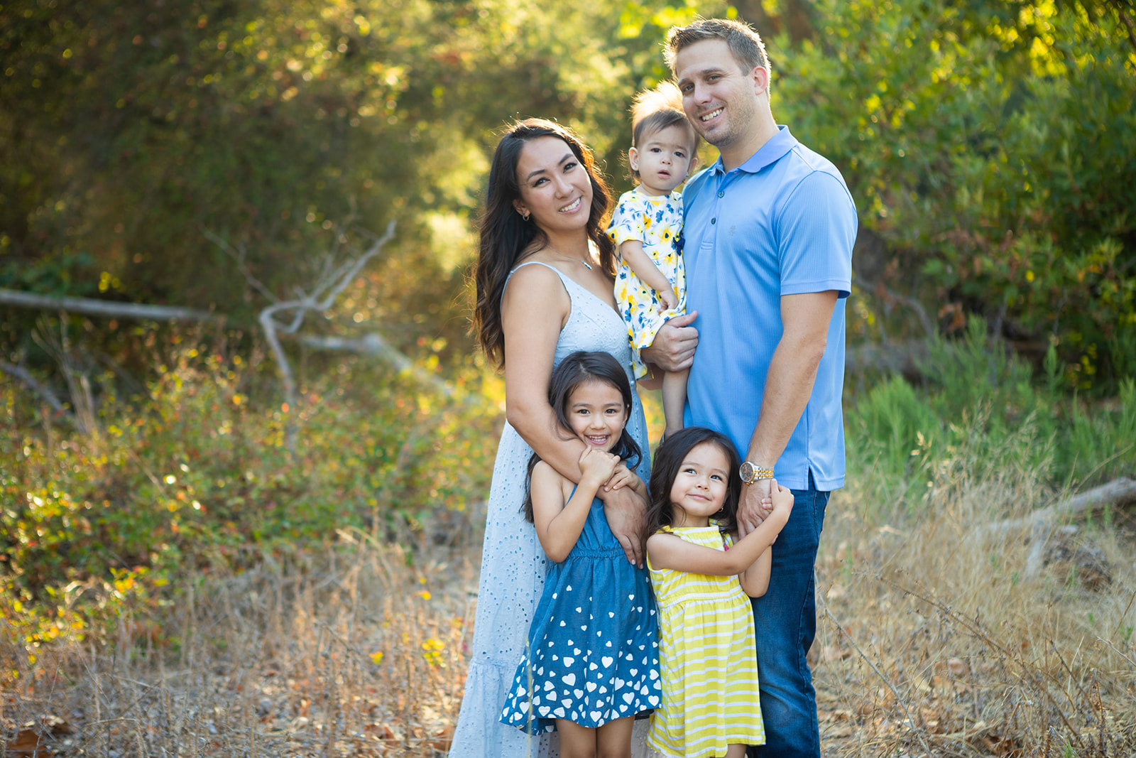 Michael Jenkins with his family outdoors